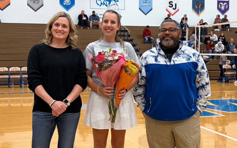Athlete Honored With Flowers During School Ceremony