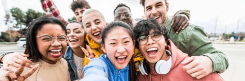 Diverse Friends Smiling Taking Selfie Outdoors