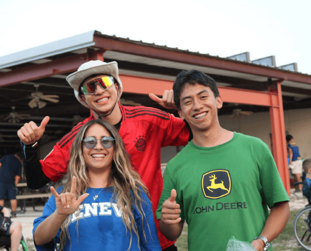 Friends Smiling At Outdoor Event