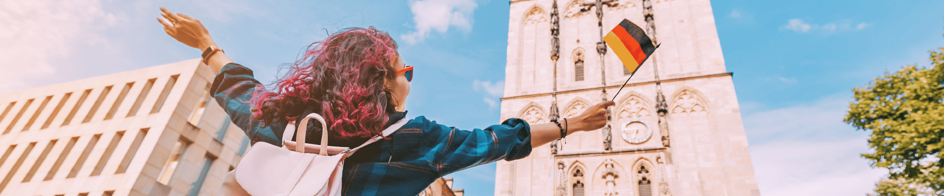 Woman Celebrating With German Flag In City Square