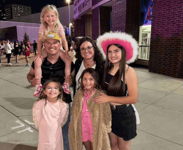 Family Group Photo At Nighttime Event