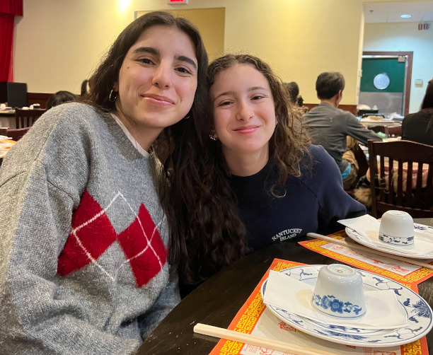 👉 Friends Smiling At Chinese Restaurant Table
